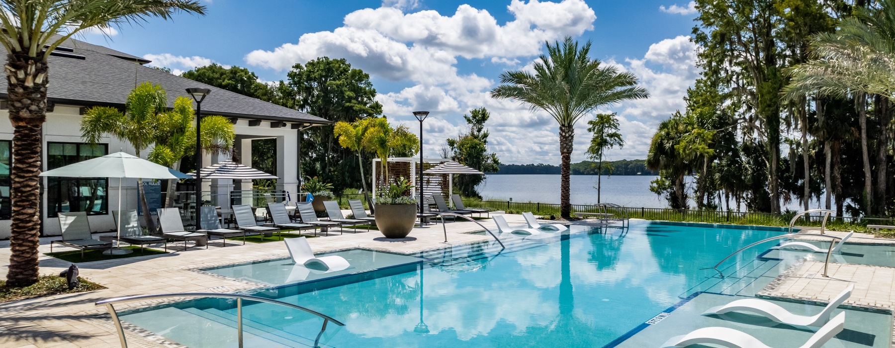 aerial view of a pool in courtyard at The Shores at Lake Howell Apartments in Casselberry, FL